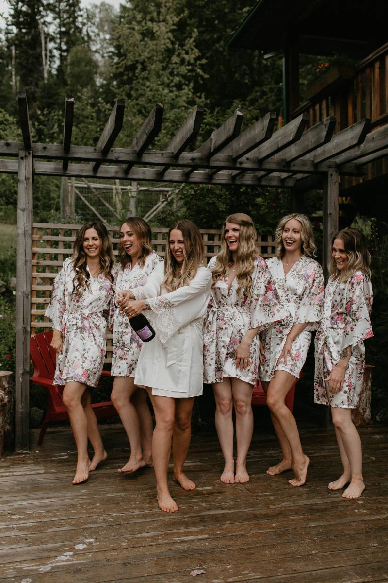 Bridesmaid shoot wearing white dresses with floral print