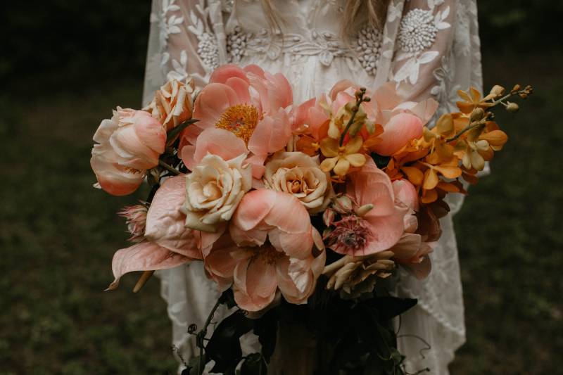 Blush bouquet and white dress with lace 