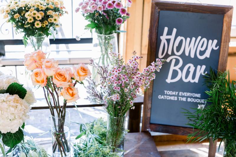 Flower bar with selection of flowers on wooden bench