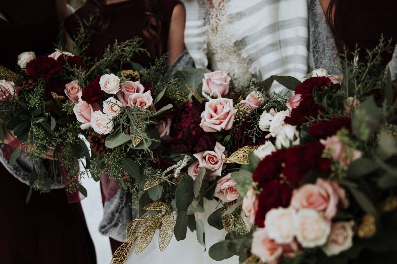 Blush pink and burgundy bouquets with gold accents 