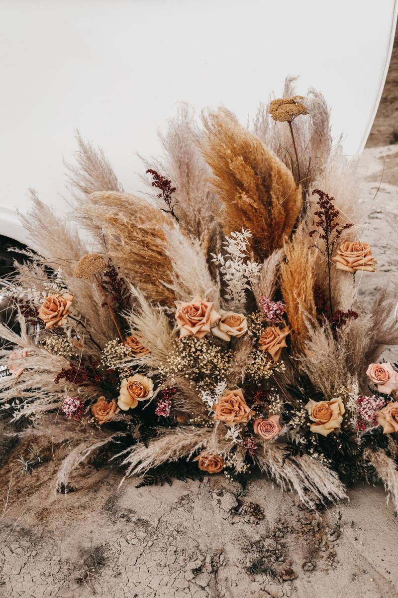 Large papas grass and pale pink floral arrangement