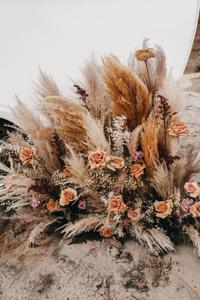 Large papas grass and pale pink floral arrangement