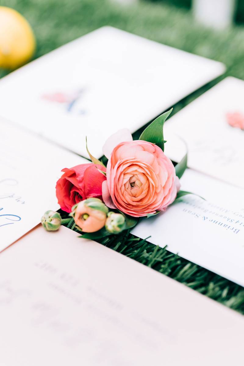 Pink and blush roses on wedding invitations 