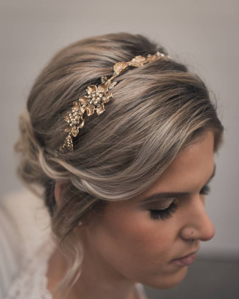 Gold flower crown on bride with grey hair 